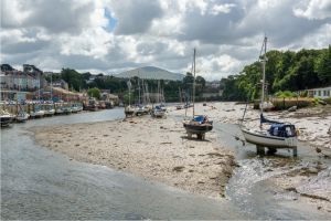 Boats on the river bed at low tide.