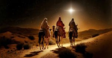 The Three Kings (or wise men) seen travelling across a desert on their camels. They are heading towards the bright star ahead of them.